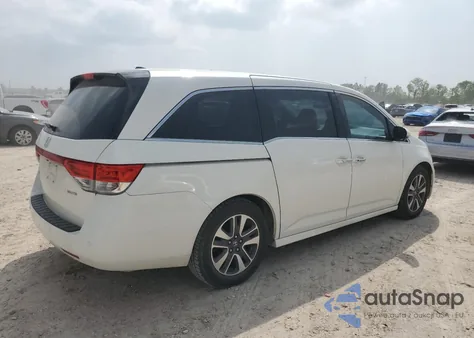 2015 Honda Odyssey Touring z USA, uszkodzony, nr VIN 5FNRL5H94FB128220